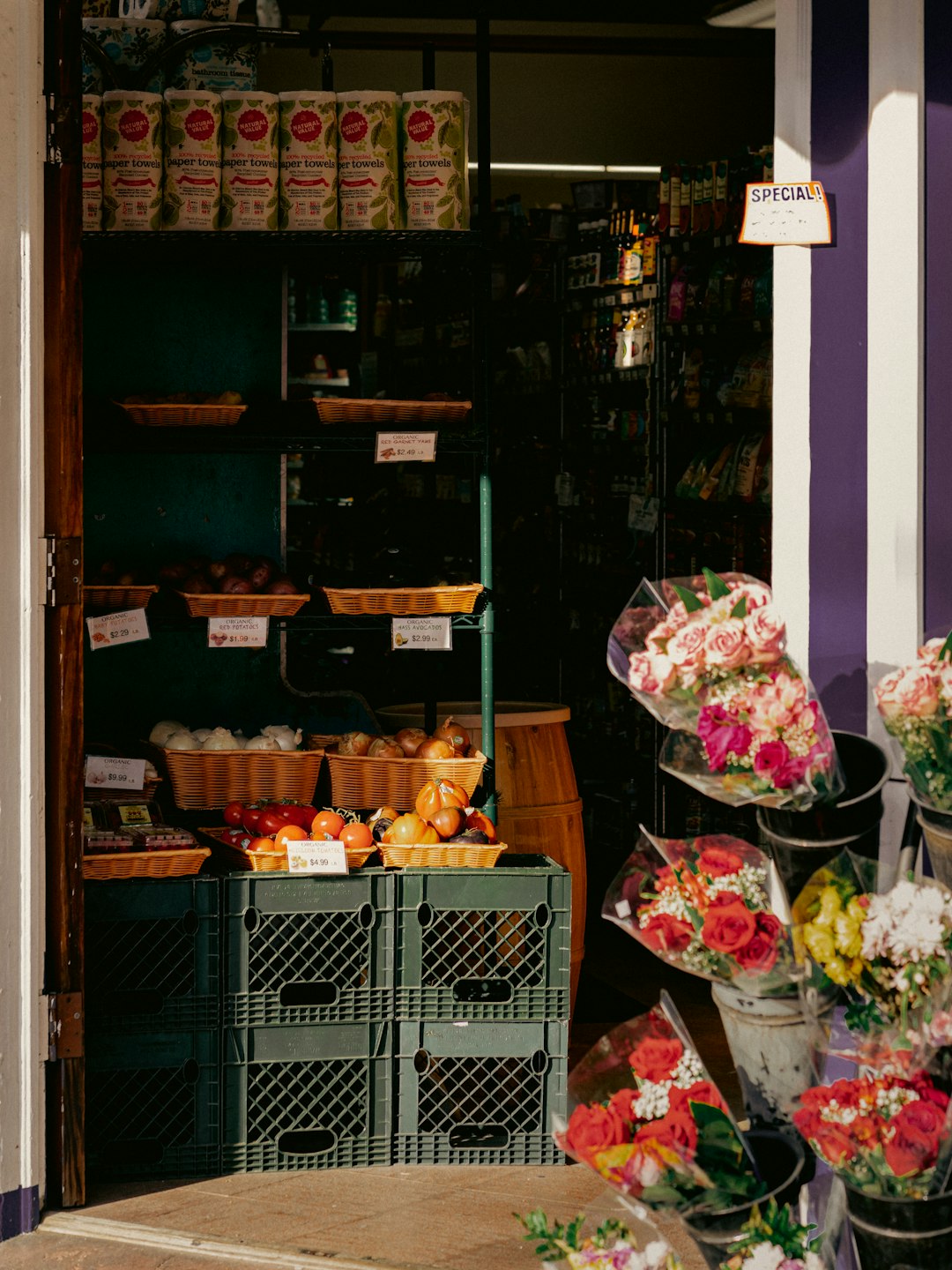 a-flower-shop-with-a-bunch-of-flowers-in-front-of-it-rel2loadyhu